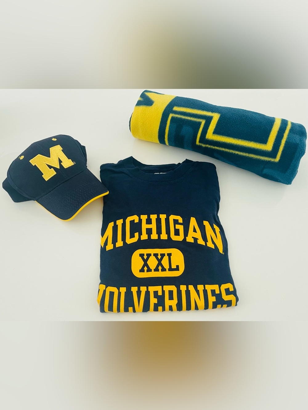 Go Blue Bundle University of Michigan Wolverines hat, T-shirt & fleece blanket.